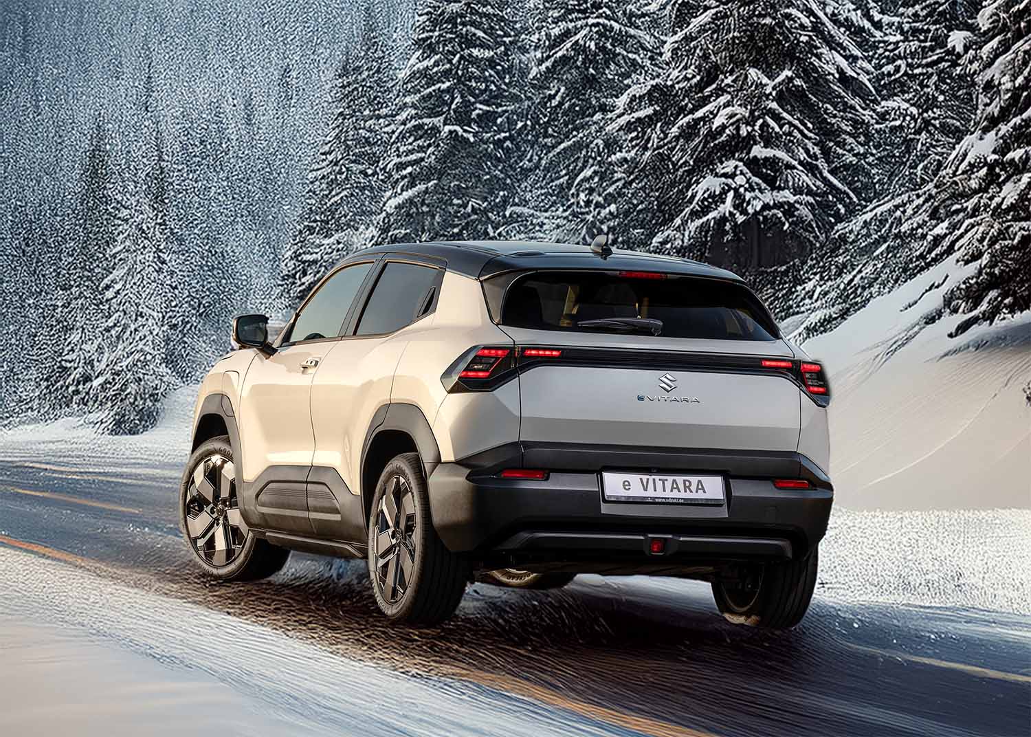 suzuki e vitara 2026 suv électrique roulant sur route de montagne au dessus d'aigle en suisse tendances automobiles suisse 2026